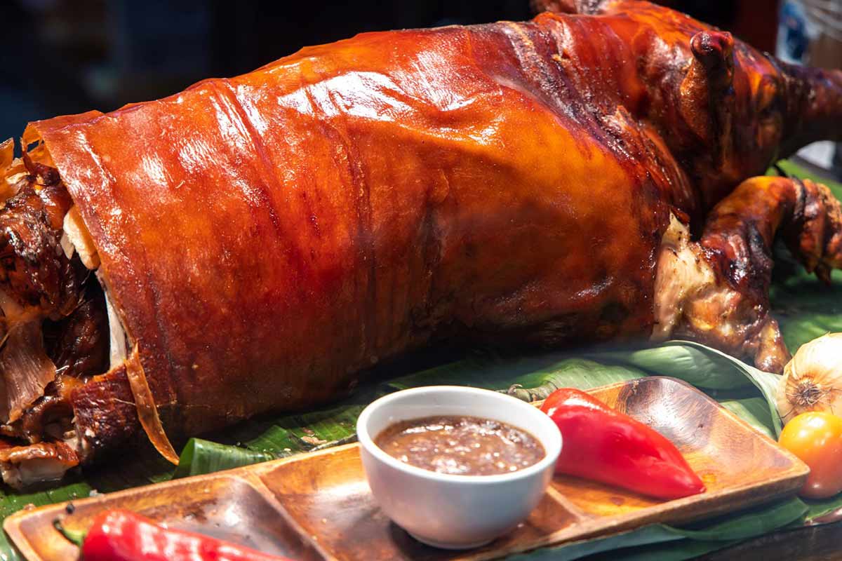 Traditional Filipino food Lechon with soy sauce