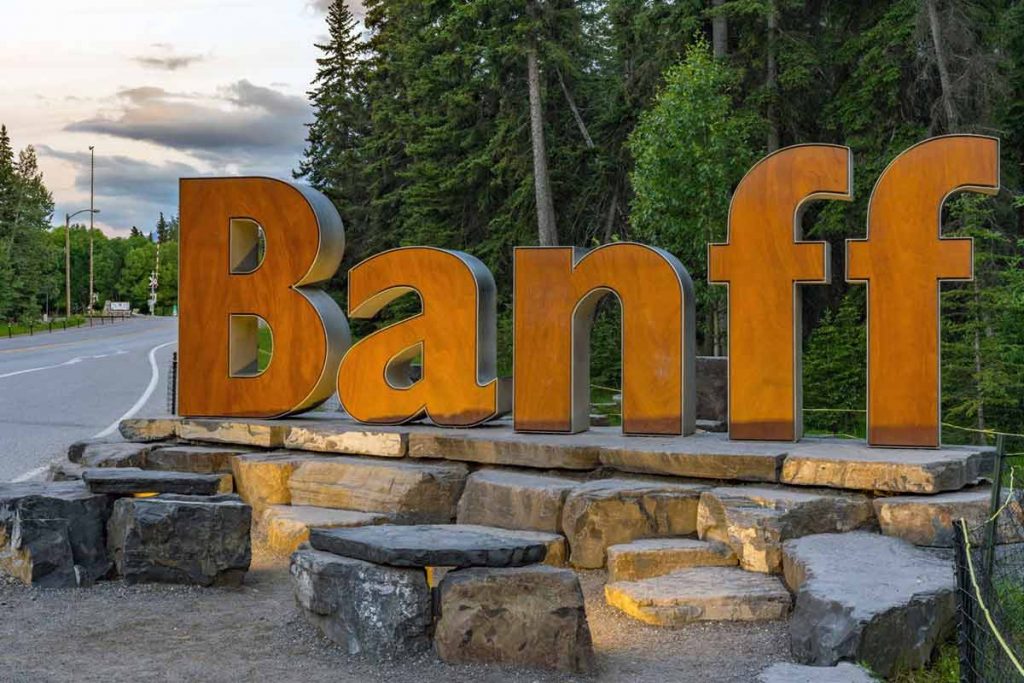 Wooden Welcome Banff signage