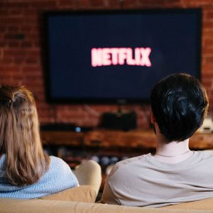 Couple watching movie with Netflix Canada subscription