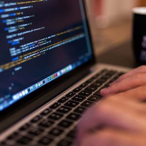 Web Developer in front of her laptop