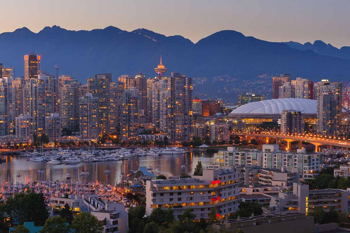 Vancouver Downtown with Grouse Mountain background view