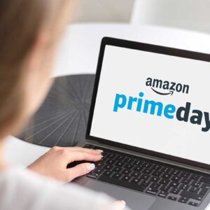 a woman browsing on computer for Amazon Prime Day deals