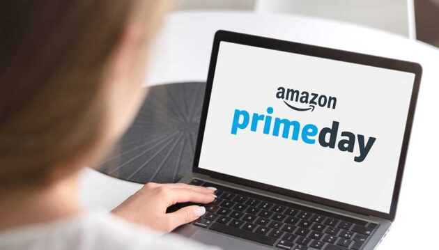 a woman browsing on computer for Amazon Prime Day deals