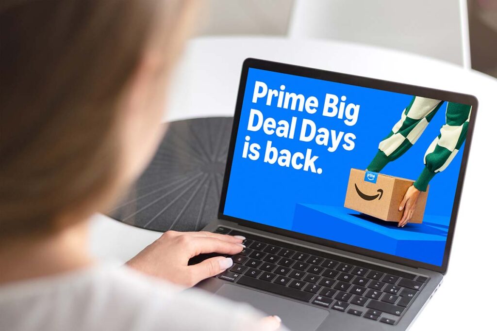 a woman browsing on computer for Amazon Prime Big Deal Days promo