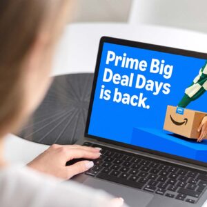 a woman browsing on computer for Amazon Prime Big Deal Days promo